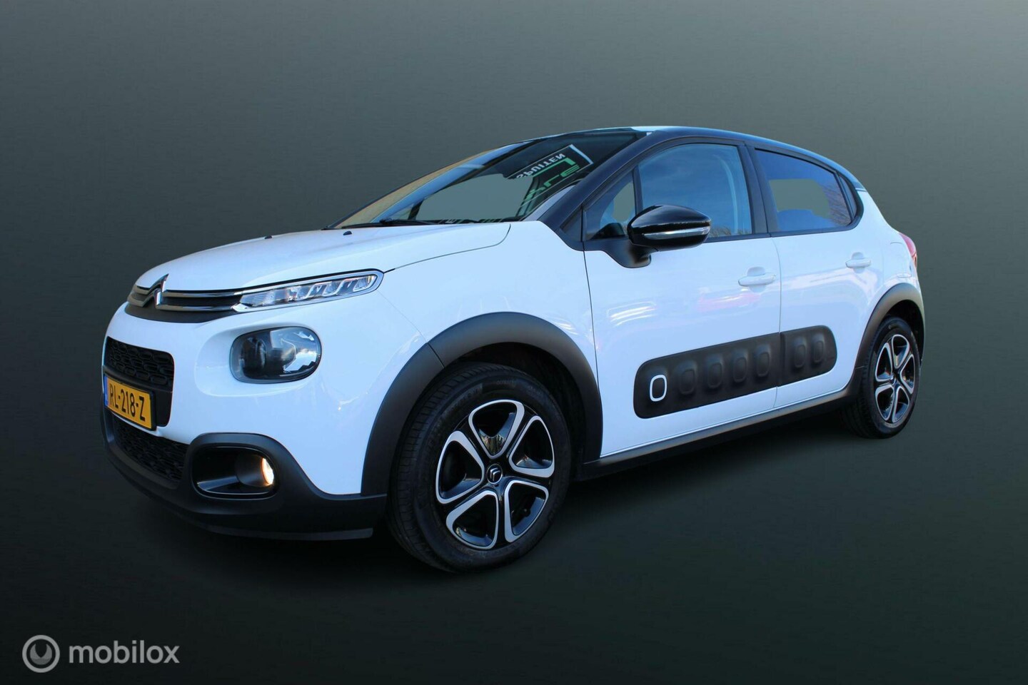 Citroën C3 - 1.2 PureTech Feel Edition 1.2 PureTech Feel Edition, Cruise, Pdc, App connect, Navi, Clima, Donkerglas. - AutoWereld.nl