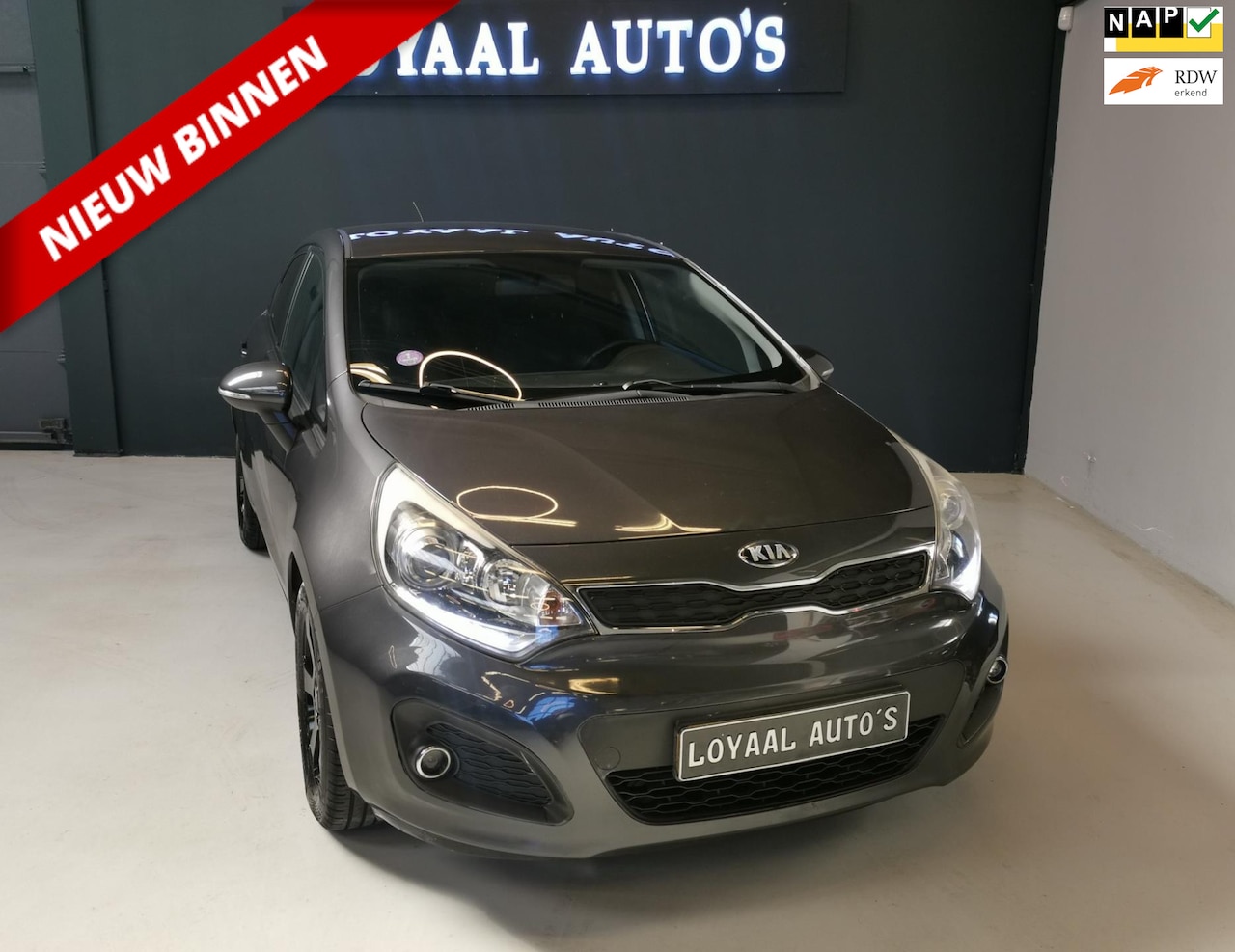 Kia Rio - 1.2 CVVT Design Edition | AIRCO | CRUISE | TREKHAAK | PDC | NAP | APK. - AutoWereld.nl
