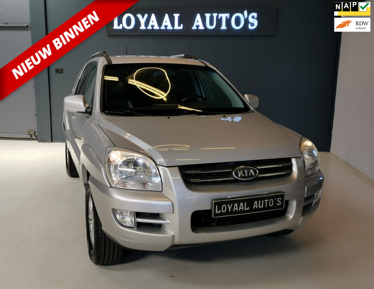 Kia Sportage - 2.0 CVVT X-pression | AIRCO | CRUISE | PDC | LEDER | ELEK.RAMEN | NAP | APK. - AutoWereld.nl