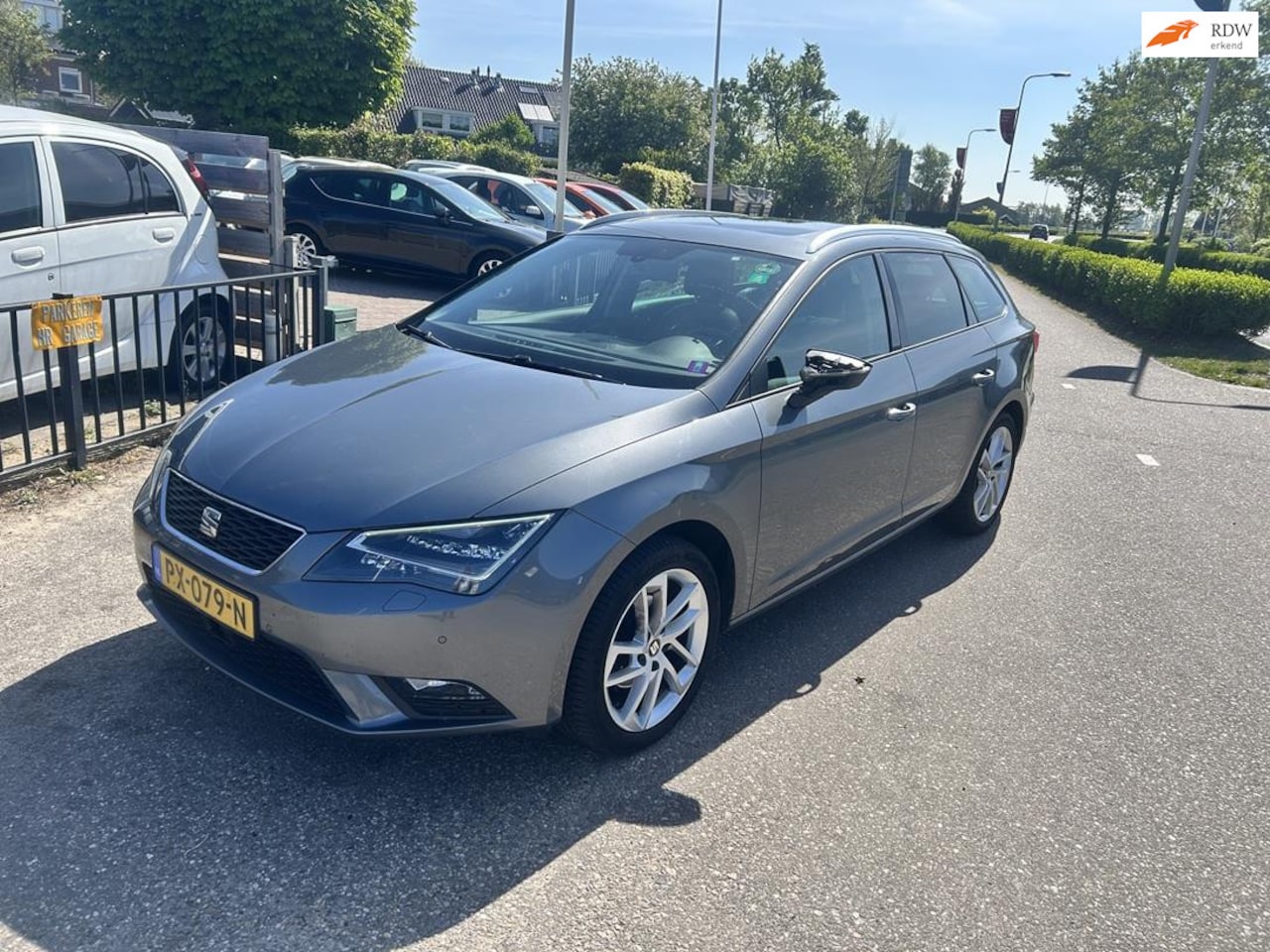 Seat Leon ST - 1.6 TDI Style First Edition AUTOMAAT! 2014! LED! PANORAMA! NAVI! - AutoWereld.nl