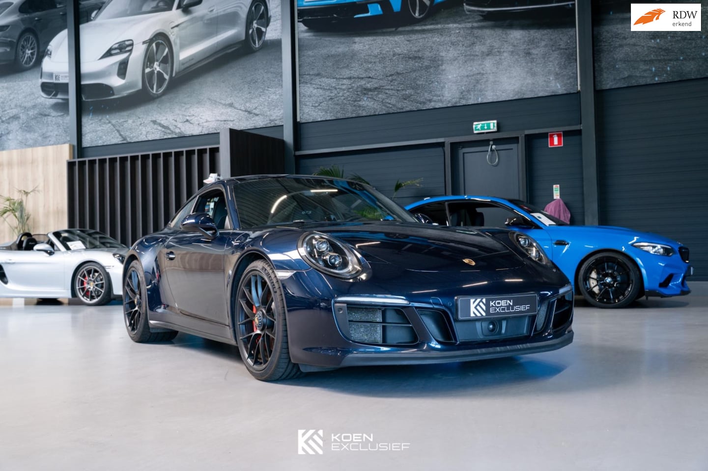 Porsche 911 - 991 3.0 Carrera GTS (2017, NL) nachtblauw, GTS interieur pakket, ducktail. - AutoWereld.nl