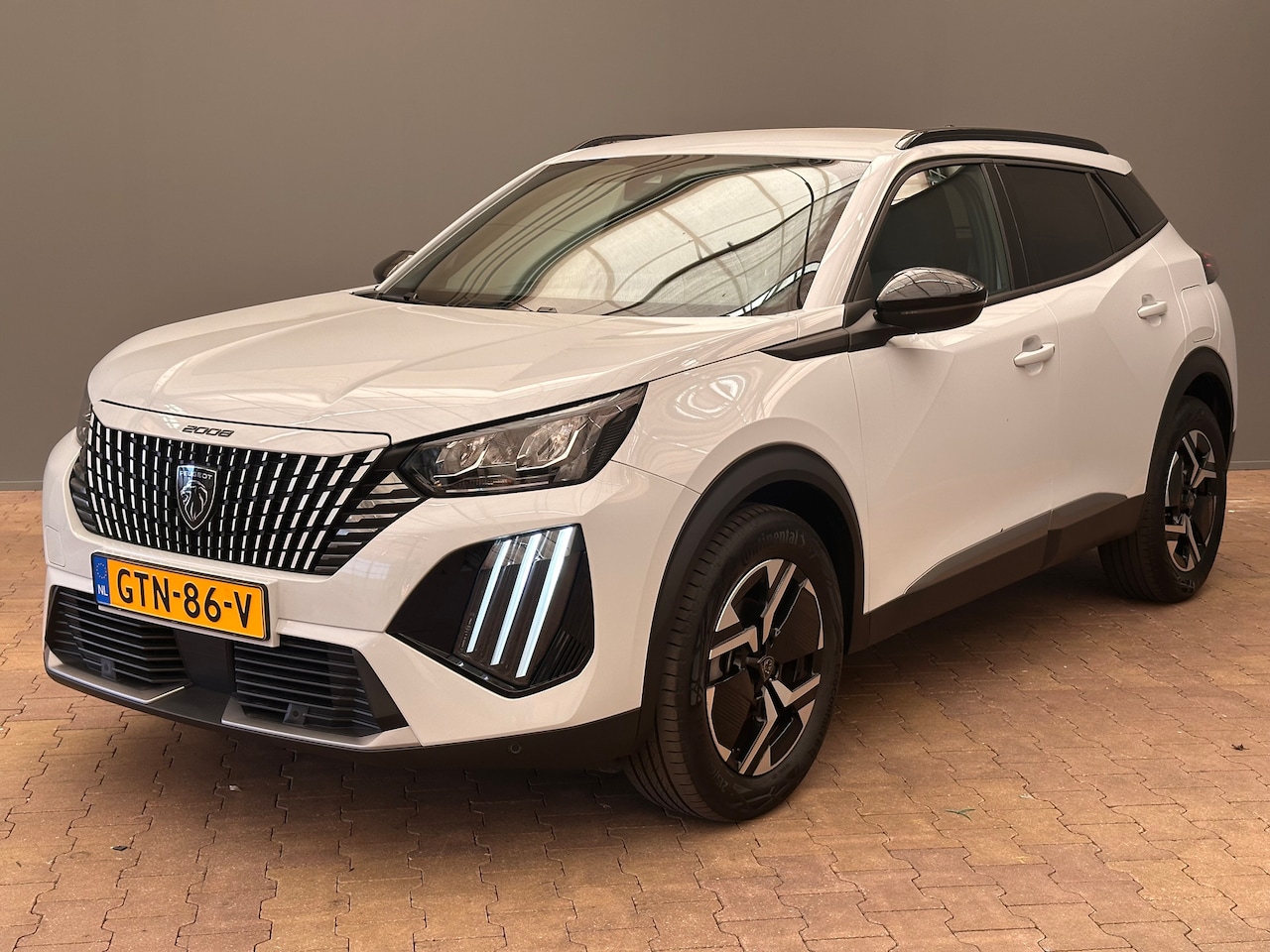 Peugeot 2008 - 1.2 PureTech Allure | Achteruitrijcamera | Cruise control - AutoWereld.nl