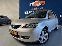 Mazda 2 - 2 1.4 Touring, bj.2003, kleur:grijs.Airco, 5 deurs, trekhaak, sportvelgen, APK 05/206, NAP