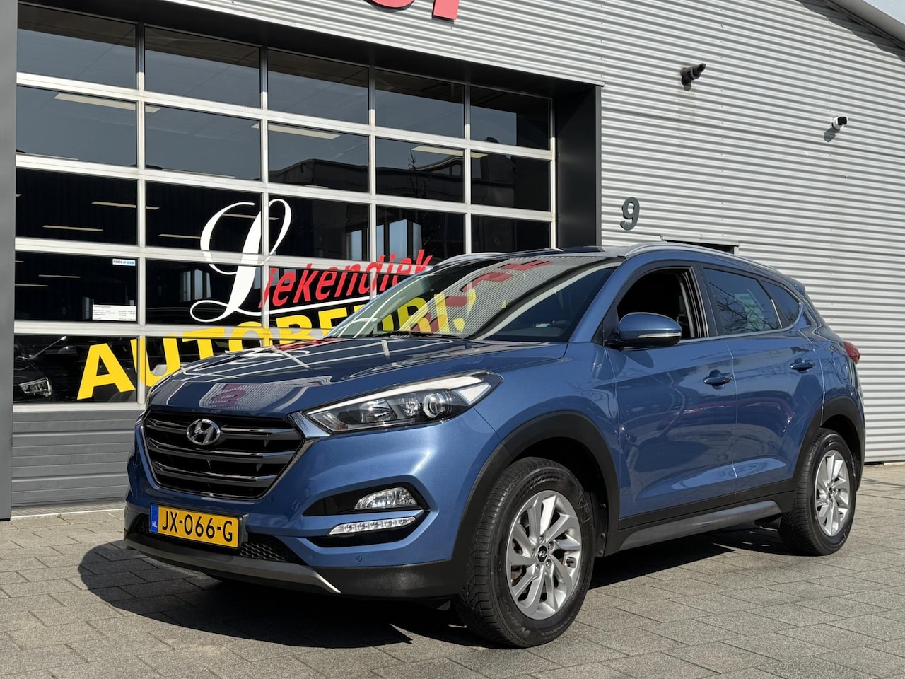 Hyundai Tucson - 1.6 GDi Comfort - Navigatie I Airco I PDC /Xenon I Sport velgen I Trekhaak I Dealer onderh - AutoWereld.nl