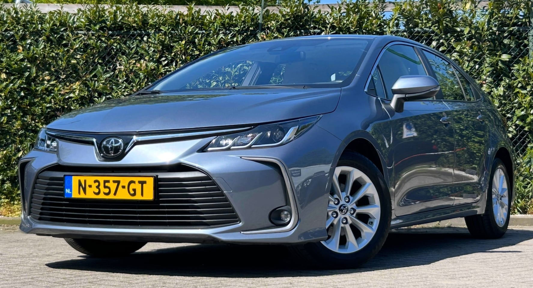 Toyota Corolla - TOYOTA 1.6 Benzine Sedan|22dkm!|1eEig|Bluetooth|Camera| - AutoWereld.nl