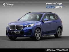 BMW iX1 - eDrive20 M Sportpakket | Veganza Schwarz | Trekhaak | Premium Pack | Panoramadak | 20 inch
