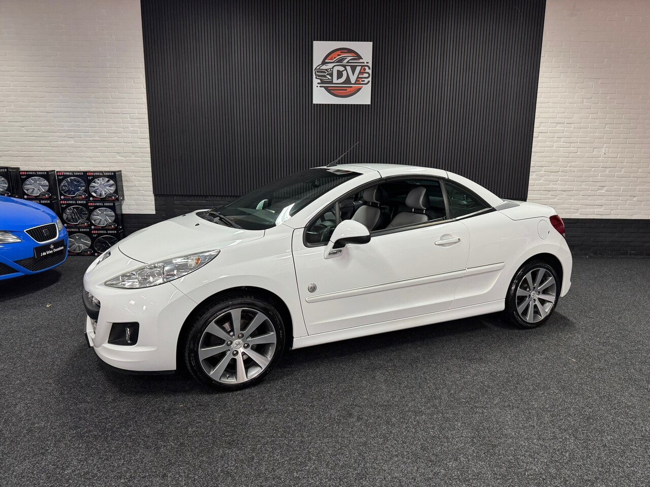 Peugeot 207 CC - 1.6 THP Roland Garros 1.6 THP Roland Garros, LEDER,CRUISE,STL VERW, PDC,CLIMAT,PDC - AutoWereld.nl