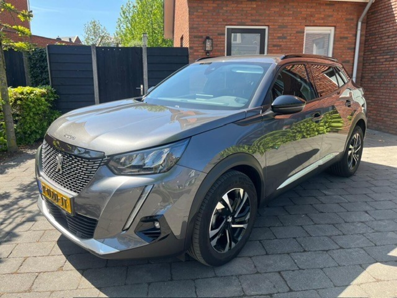 Peugeot 2008 - 1.2 PureTech Allure Pack | Navi | Keyless | Achteruitrijcamera | NL-auto - AutoWereld.nl