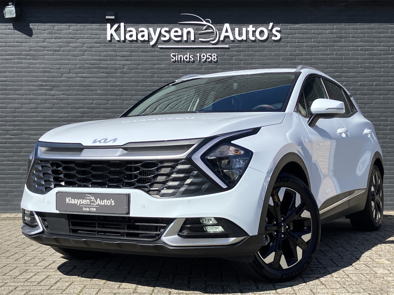 Kia Sportage - 1.6 T-GDi PHEV 265 pk DynamicLine 4WD AUT. | 1e eigenaar | dealer onderhouden | navigatie - AutoWereld.nl