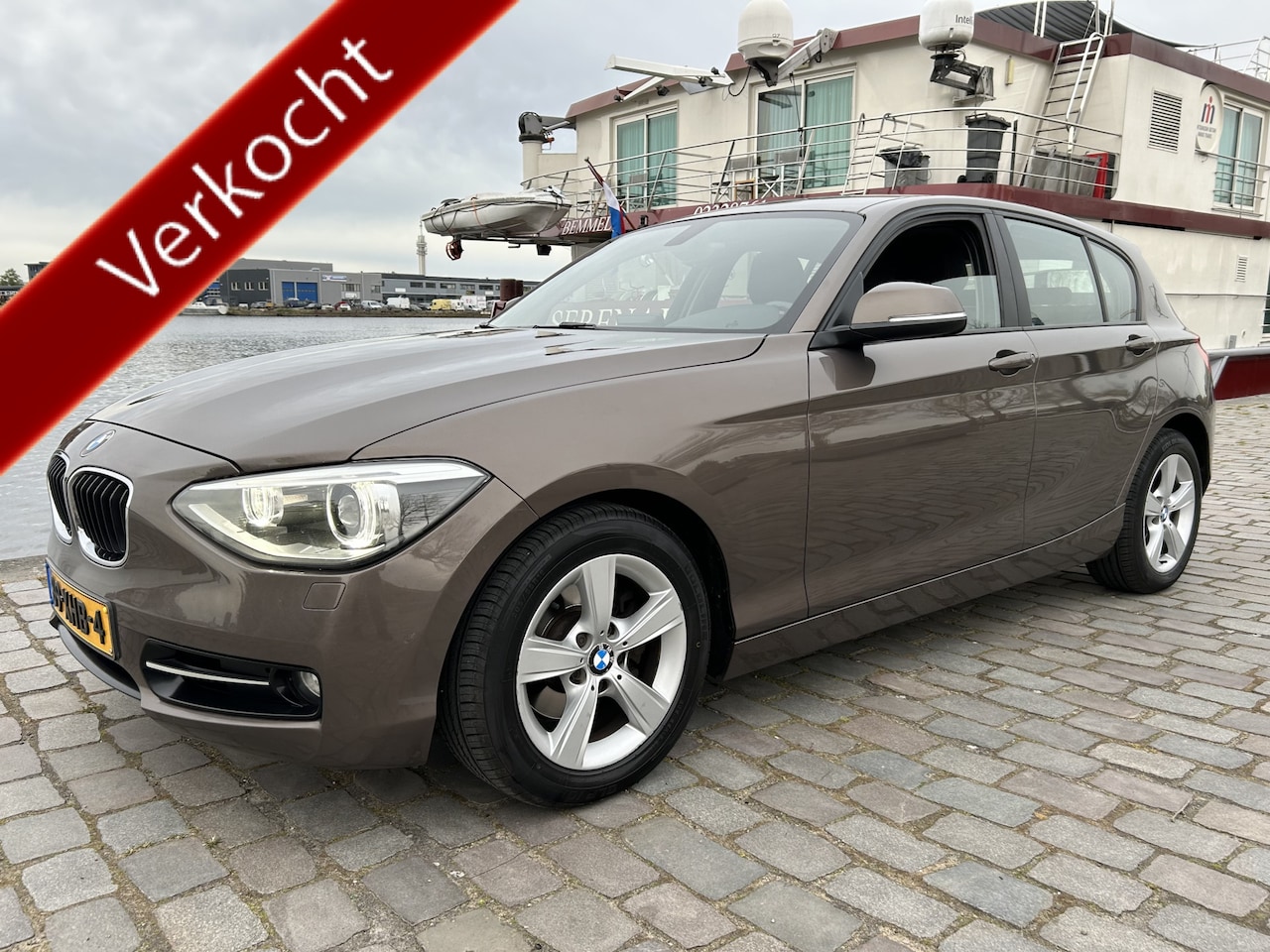 BMW 1-serie - 118i Business+ Aut. Airco Xenon PDC - AutoWereld.nl