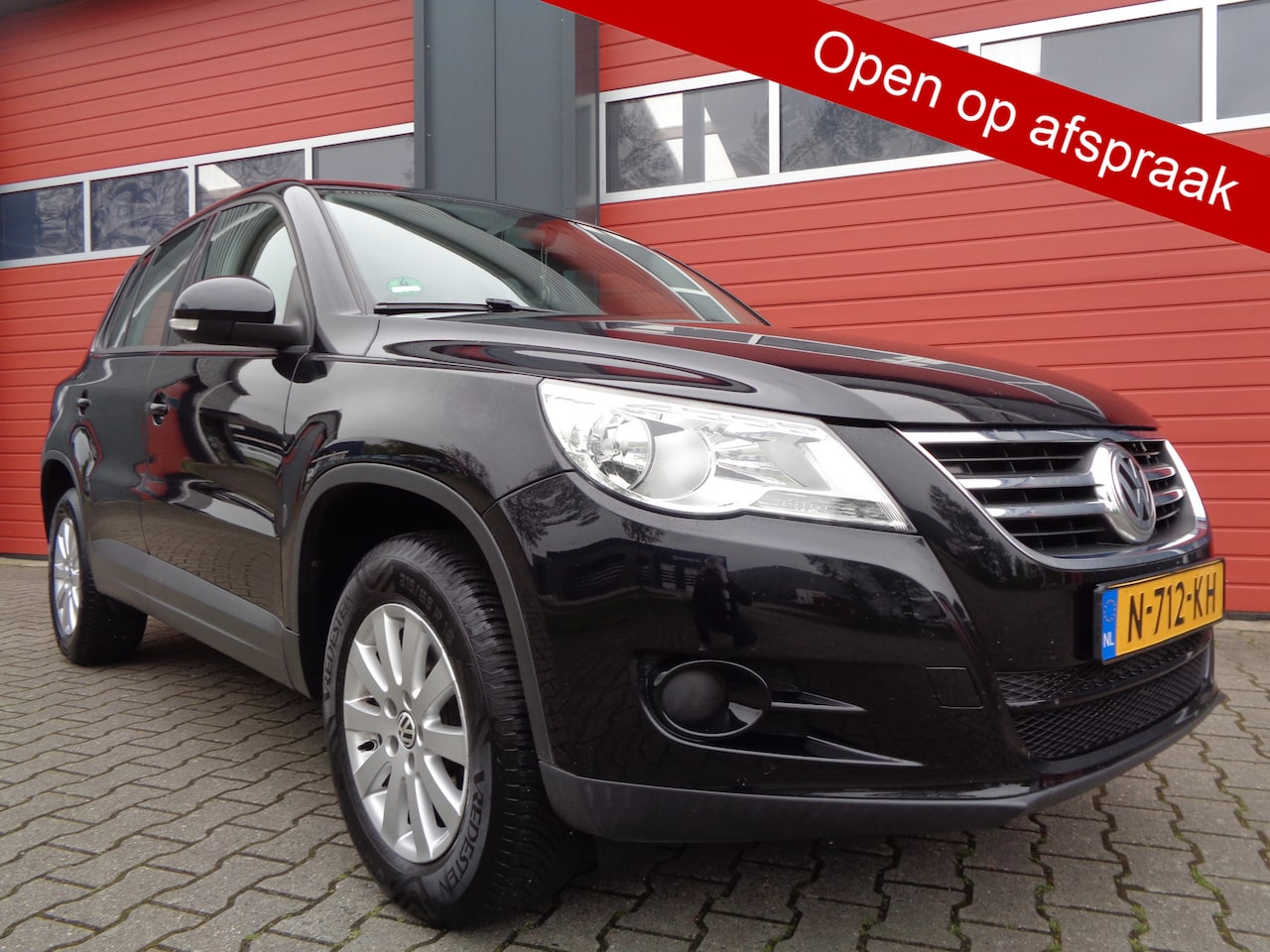 Volkswagen Tiguan - 1.4 TSI Comfort&Design 150PK Airco Cruise LMV - AutoWereld.nl