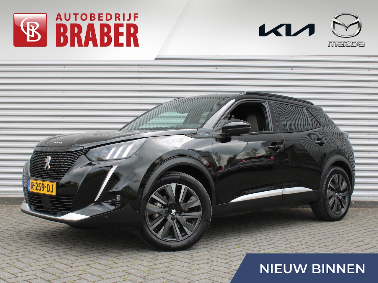 Peugeot e-2008 - EV GT Pack 50 kWh | Stoelverwarming | Pano dak | Camera | 18" LM | Cruise adaptief | Clima - AutoWereld.nl