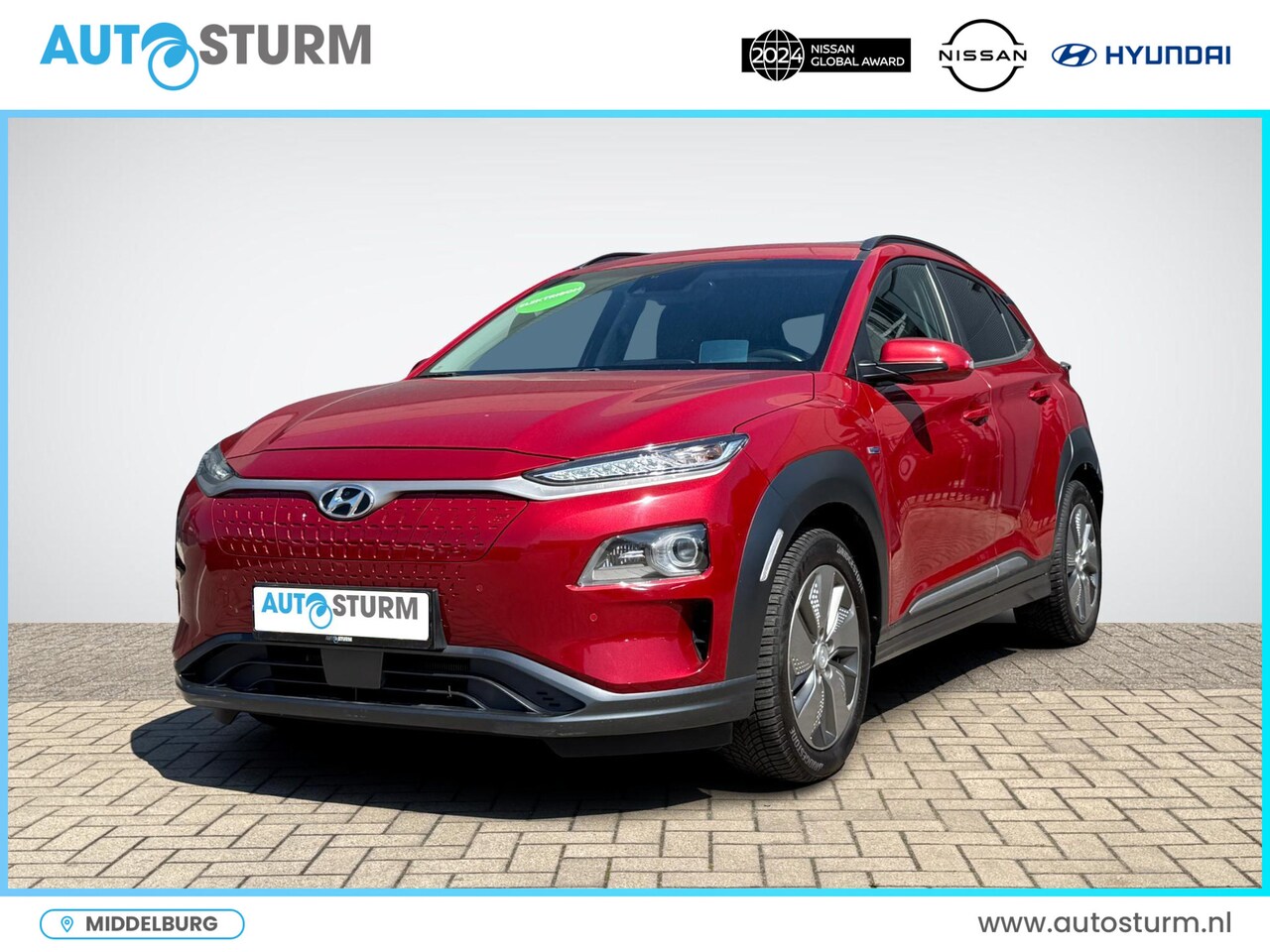 Hyundai Kona Electric - EV Premium 64 kWh | Head-Up Display | Navigatie | Camera | Leder | Adapt. Cruise Control | - AutoWereld.nl