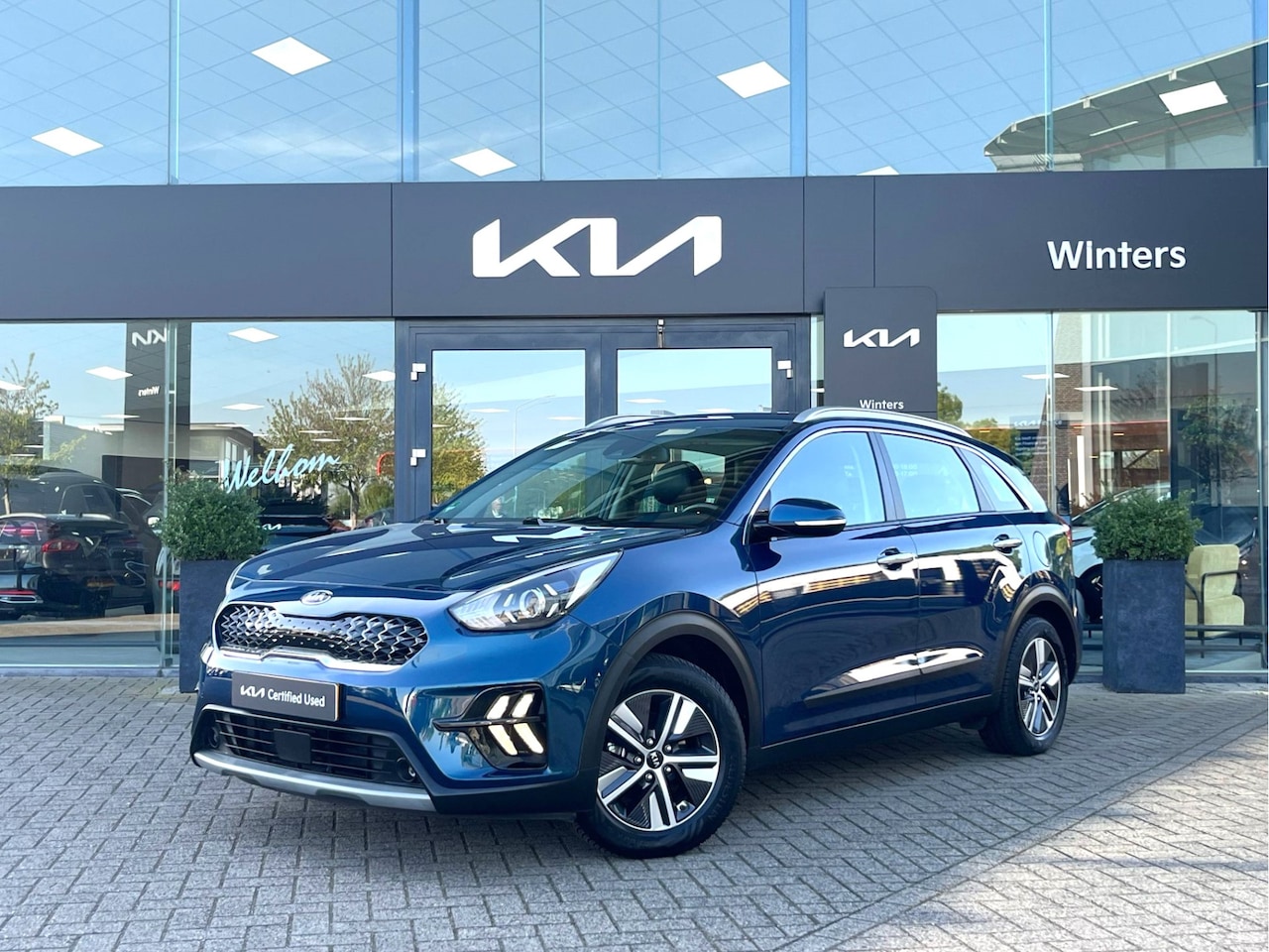 Kia Niro - 1.6i-16V Hybrid DynamicLine DCT6/Autom. ECC Cr.Control-Adapt. Navi+Camera BT+USB Trekhaak - AutoWereld.nl
