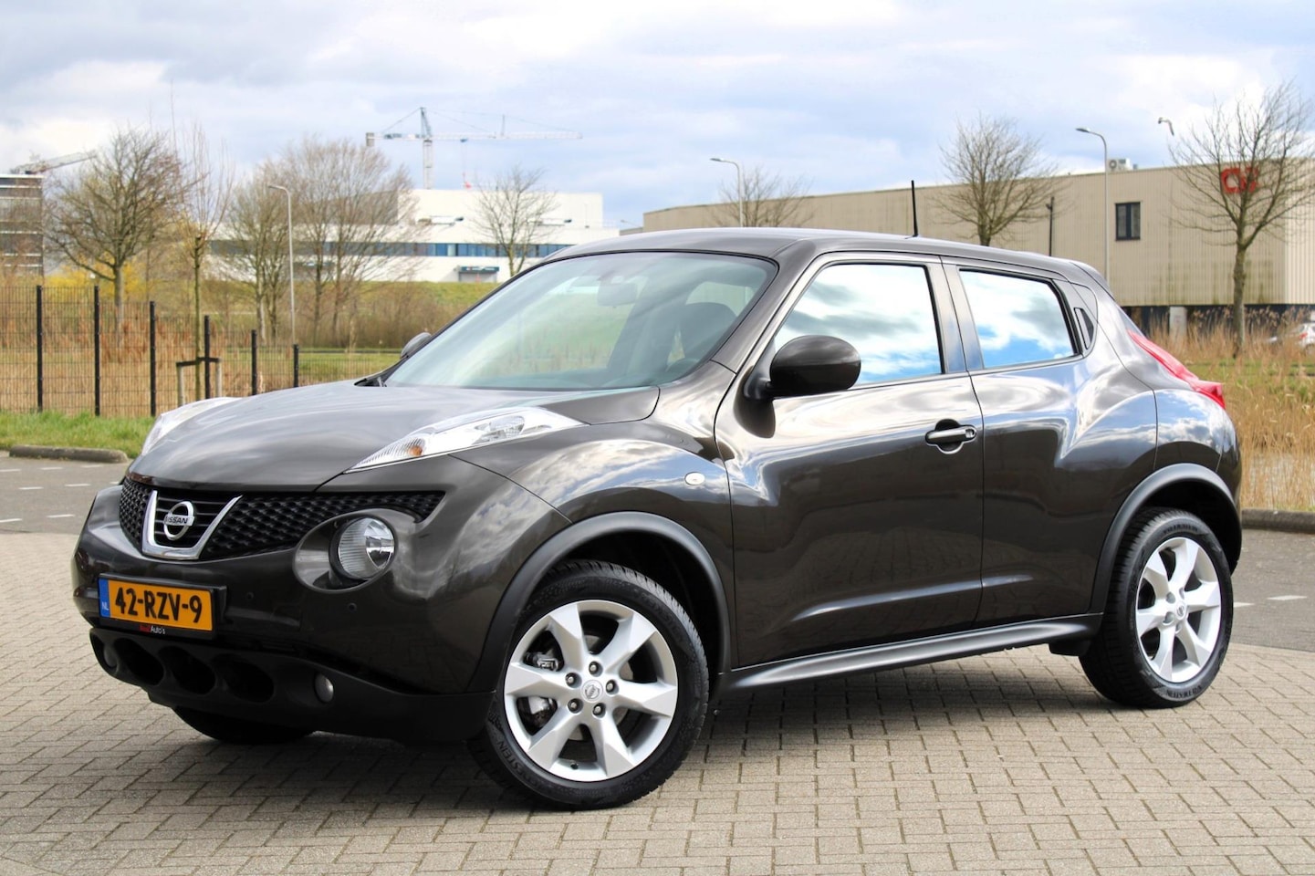 Nissan Juke - 1.6 Acenta l Climate l PDC l Cruise l Navigatie - AutoWereld.nl