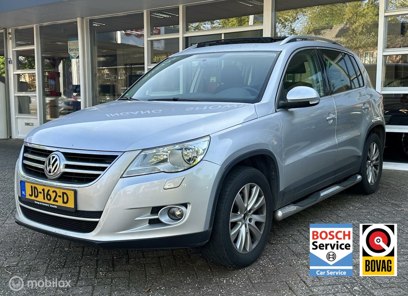 Volkswagen Tiguan - 2.0 TSI Sport&Style 4Motion Pano, Climat, Navi, Pdc, LM.. - AutoWereld.nl