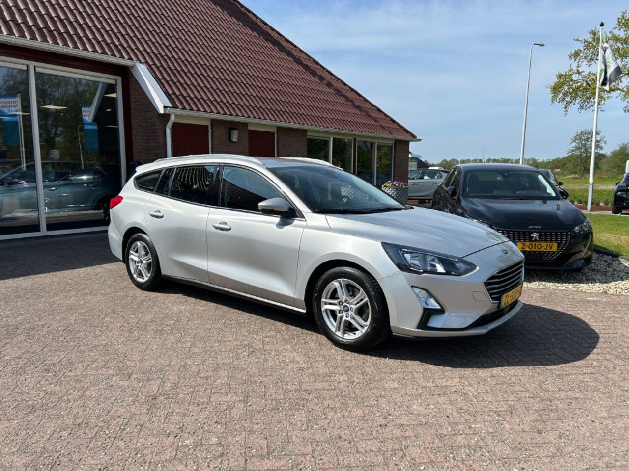Ford Focus Wagon - 1.0 EcoBoost Trend Edition Business 1.0 ECOBOOST WAGON TREND EDITION BUSINESS - AutoWereld.nl