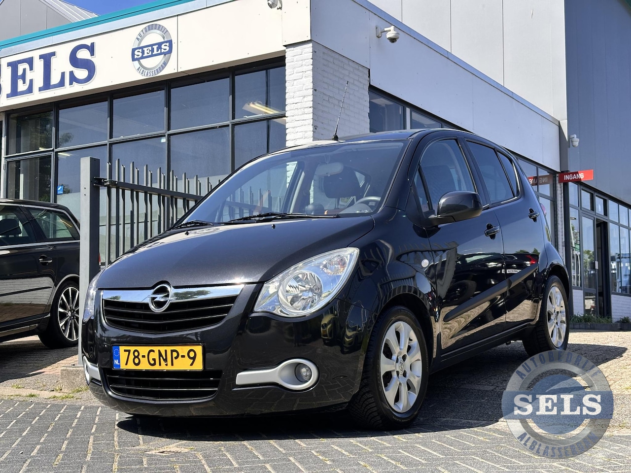Opel Agila - 1.2 Enjoy AUTOMAAT/HOGEINSTAP - AutoWereld.nl