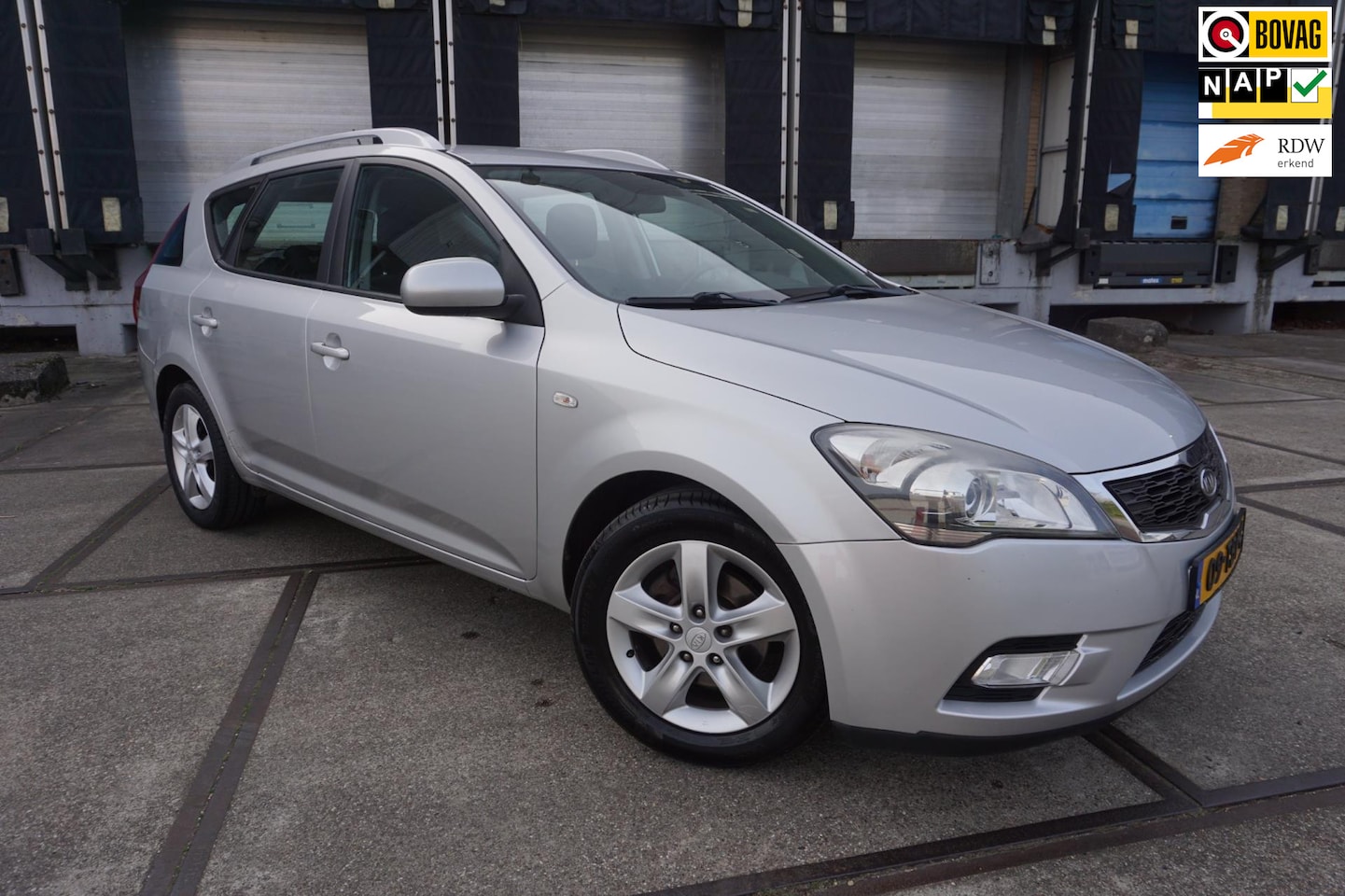 Kia Cee'd Sporty Wagon - 1.4 CVVT Navigator Plus Pack * Camera * Navi * - AutoWereld.nl