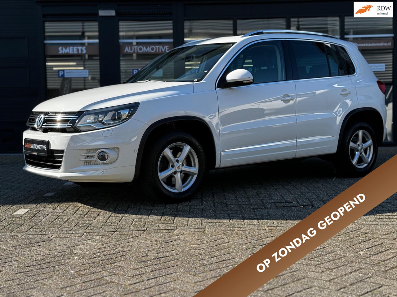 Volkswagen Tiguan - 2.0 TSI Sport&Style 4Motion TREKHAAK AFNEEMBAAR - AutoWereld.nl