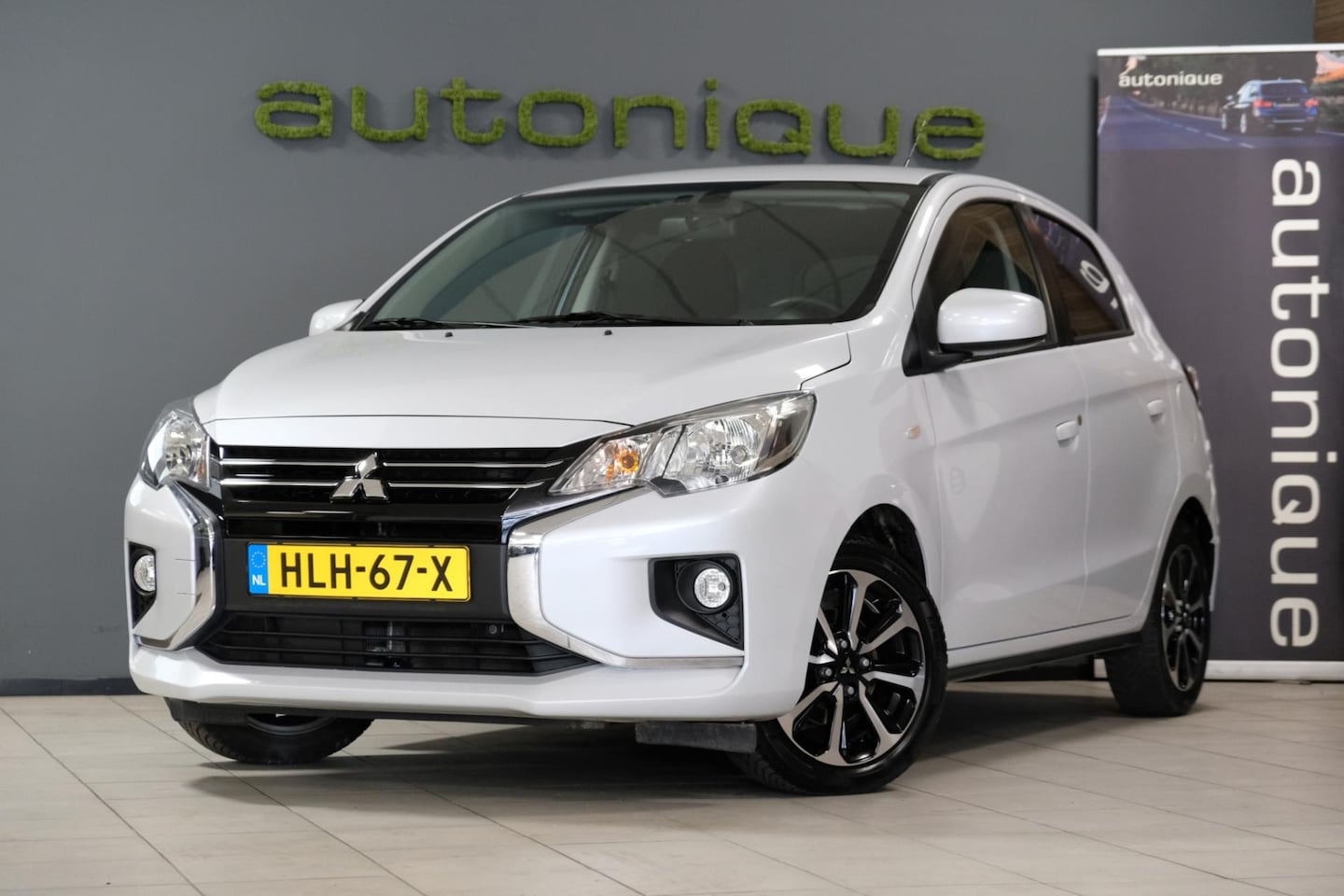 Mitsubishi Space Star - 1.2 *Navigatie/Apple Carplay* 62dkm PARELMOER WIT - AutoWereld.nl