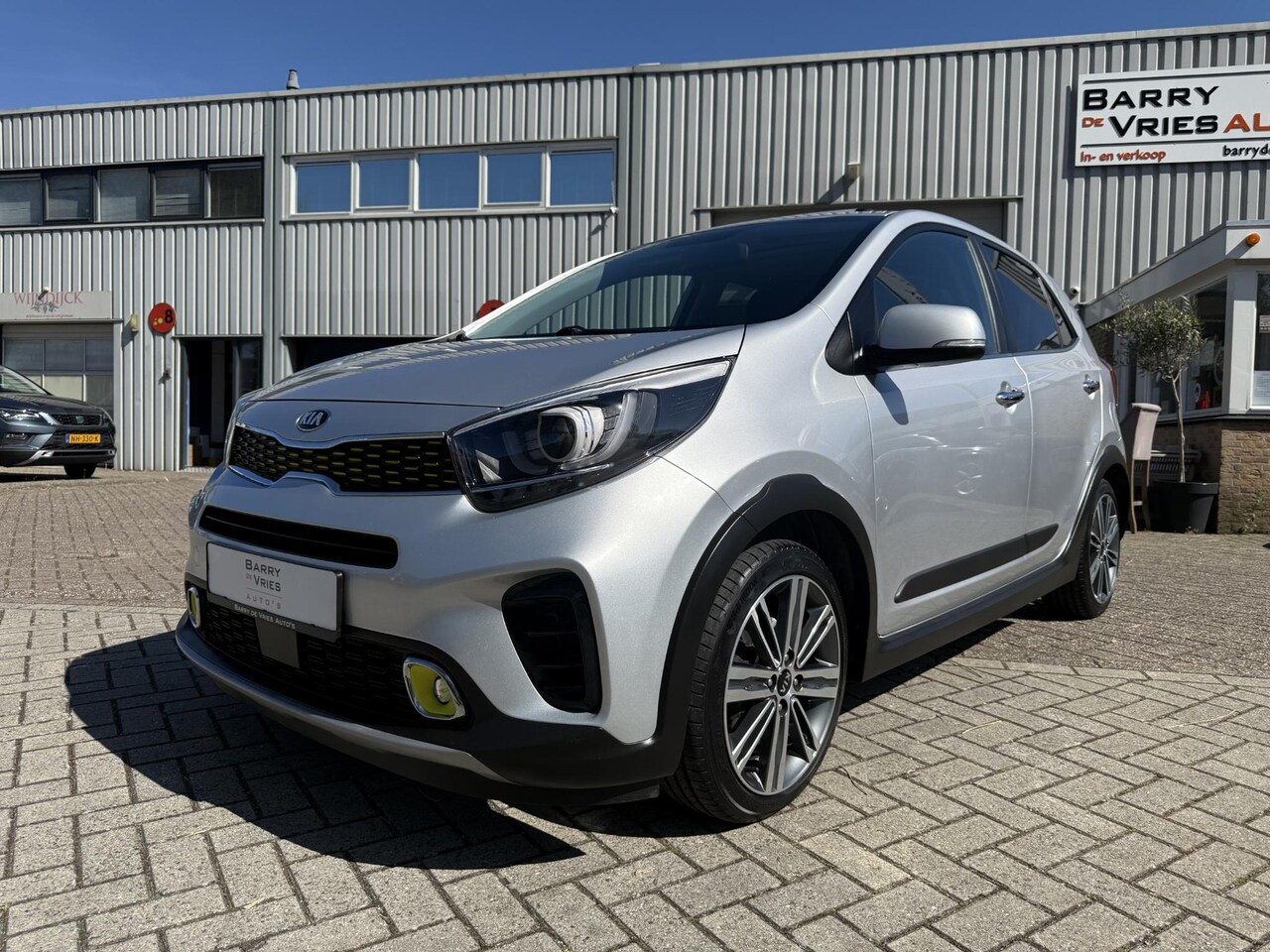 Kia Picanto - 1.2 CVVT X-Line | Schuifdak | Apple Carplay | Half Lederen bekleding | Navigatie | - AutoWereld.nl