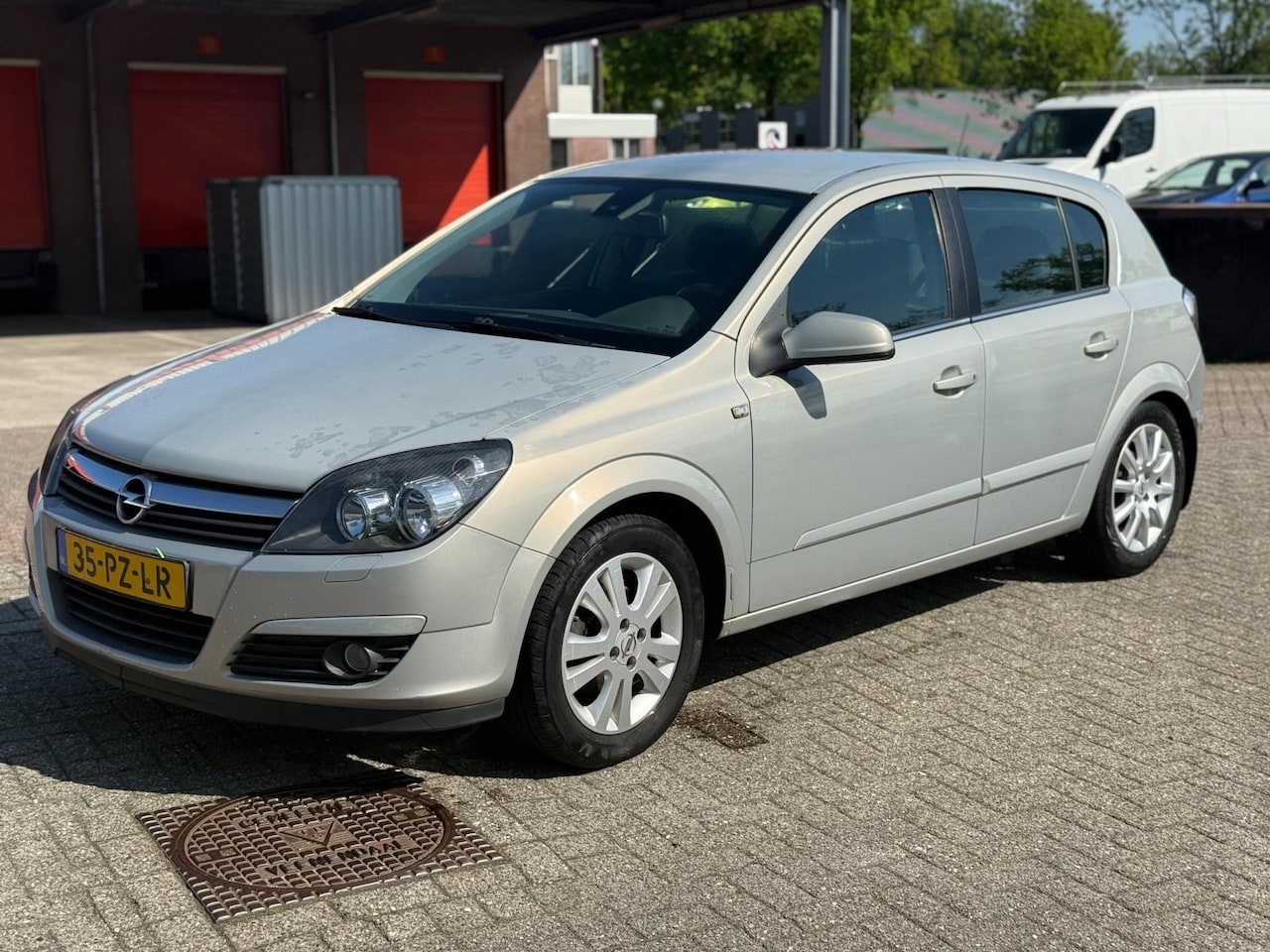 Opel Astra - 1.6 Elegance | Airco | Extra set sportvelgen/banden - AutoWereld.nl