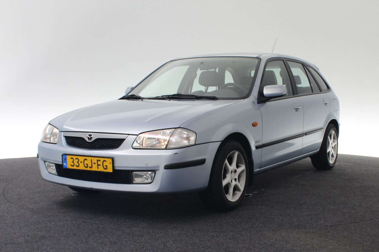 Mazda 323 Fastbreak - Airco, NL-auto, dealer onderhouden 1.5i GLX - AutoWereld.nl