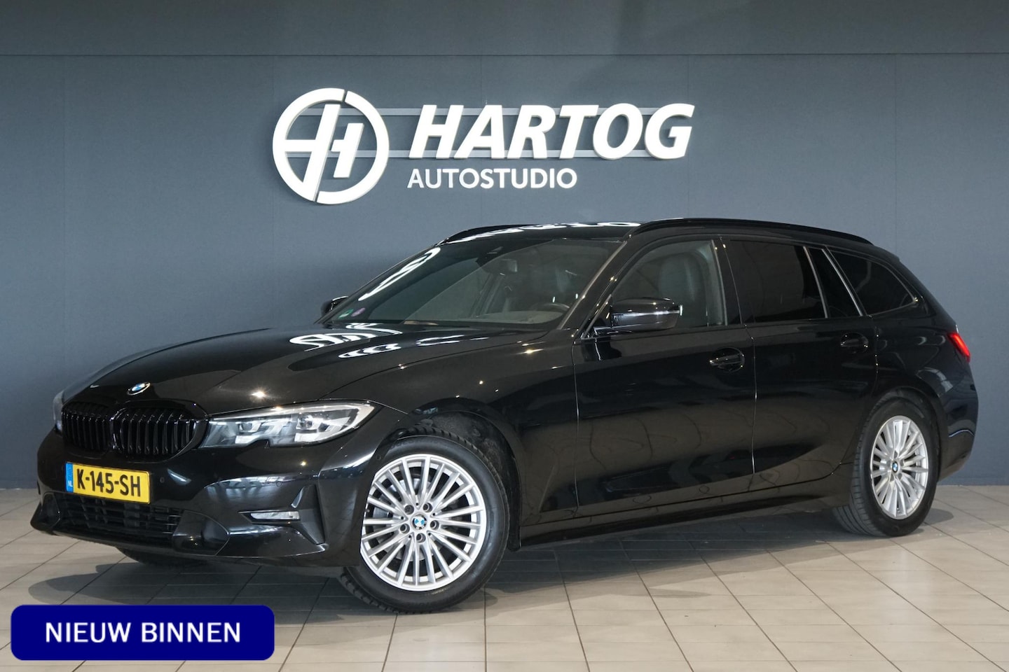 BMW 3-serie Touring - 318i High Executive *INCL. BTW* + HEAD-UP / SPORTSTOEL - AutoWereld.nl
