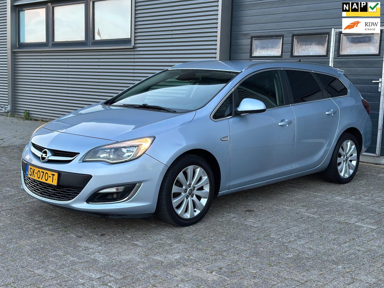 Opel Astra Sports Tourer - 1.4 Turbo Sport + NAVI - NETTE AUTO - TREKHAAK - APK. - AutoWereld.nl