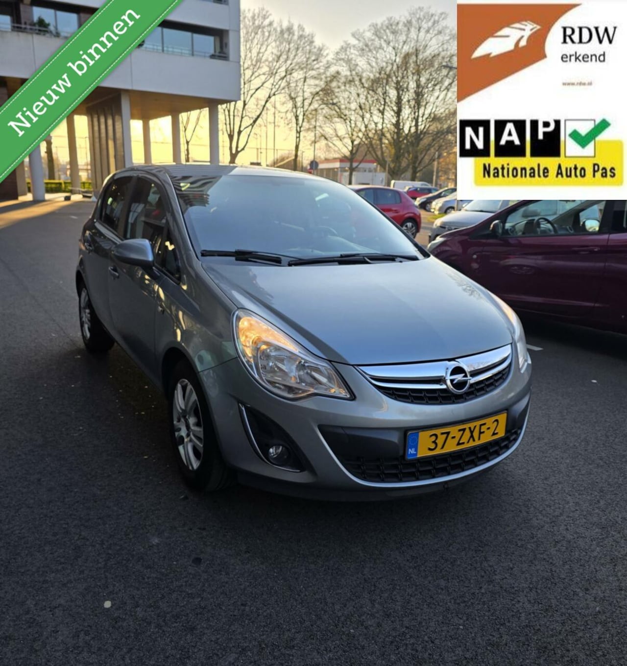 Opel Corsa - 1.2-16V FACELIFT 2013 5drs Airco/NAVI/PDC/APK - AutoWereld.nl