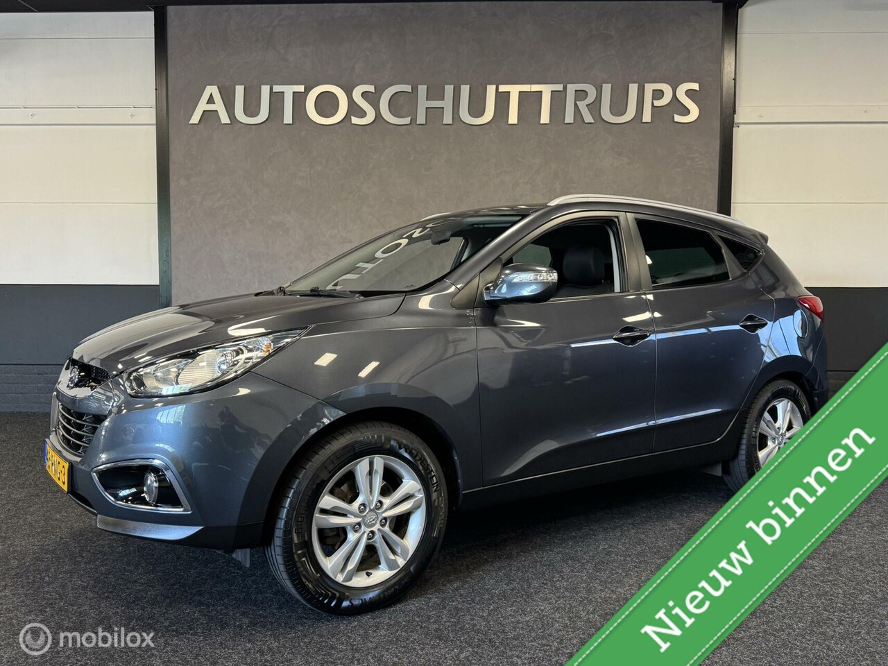 Hyundai ix35 - 2.0i 4WD Business Edition AUTOMAAT / NAP - AutoWereld.nl