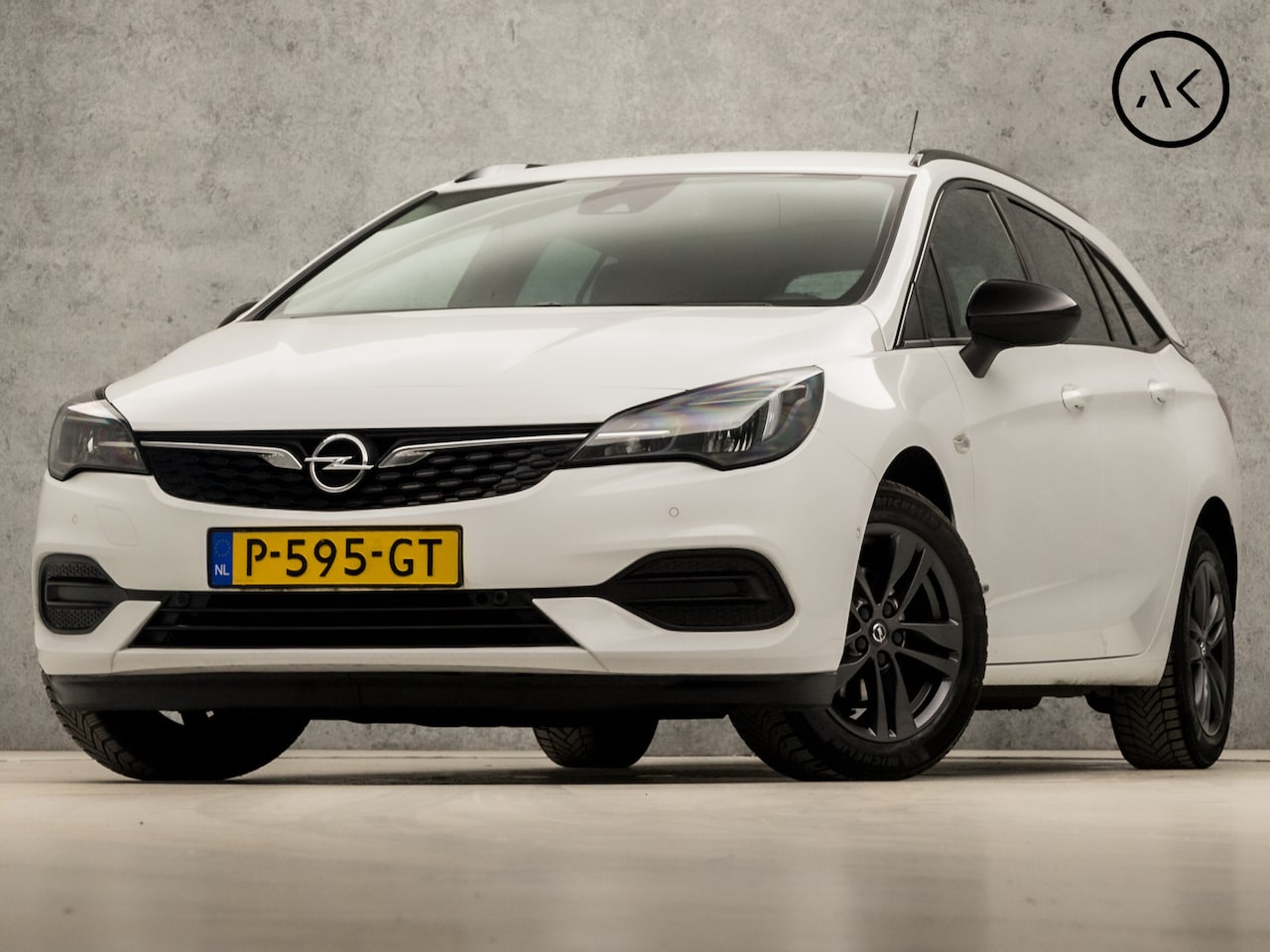 Opel Astra Sports Tourer - 1.2 Design & Tech (APPLE CARPLAY, NAVIGATIE, CAMERA, CLIMATE, GETINT GLAS, SPORTSTOELEN, P - AutoWereld.nl