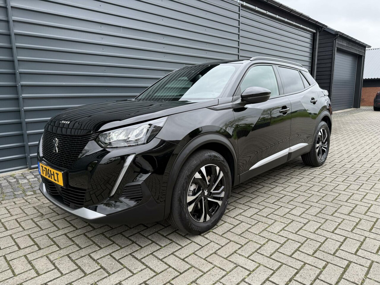 Peugeot e-2008 - EV Allure Pack 50 kWh SOH 97% 360 Camera Navi - AutoWereld.nl
