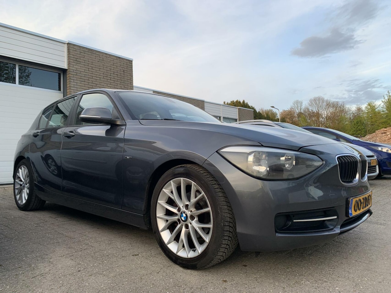BMW 1-serie - 116i Sport Edition NWE APK Airco Leer Navi Grootscherm Elektrische pakket - AutoWereld.nl