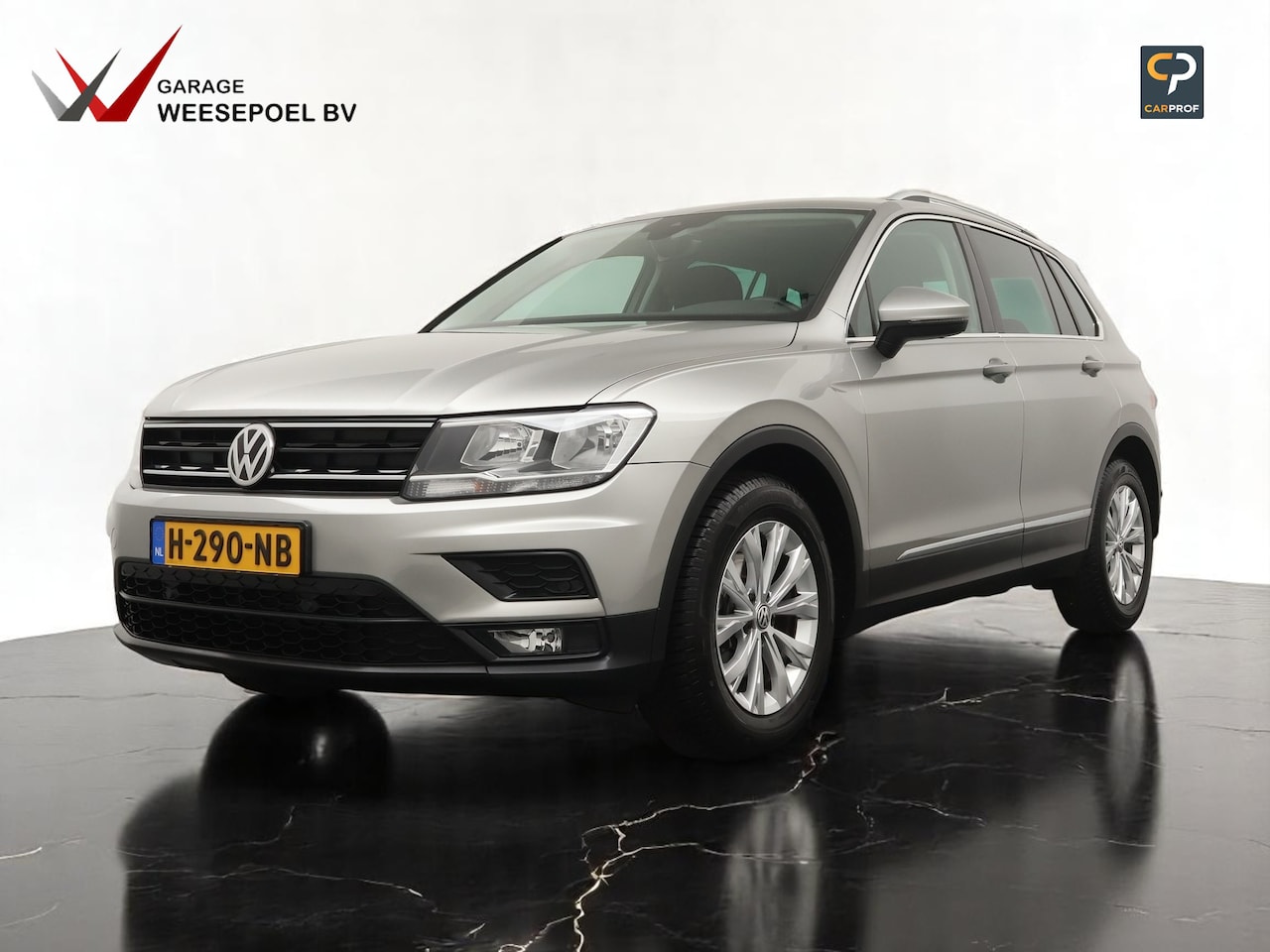 Volkswagen Tiguan - 1.5 TSI 131PK Comfortline Business Navi - Navigatie - Climate control - Adaptieve Cruise c - AutoWereld.nl