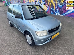 Daihatsu Cuore - 1.0-12V XTi elektrische ramen centrale vergrendeling apk januari 2026 rijd heerlijk boeken