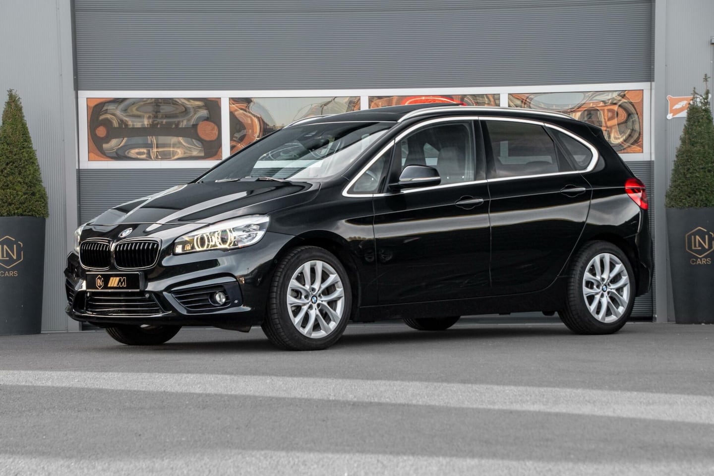 BMW 2-serie Active Tourer - M-Pakket 225i Sport | Pano | HUD - AutoWereld.nl