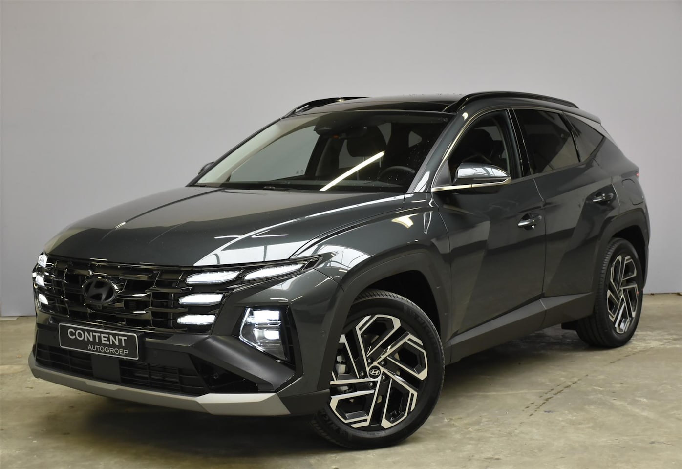 Hyundai Tucson - 1.6 T-GDI PHEV Premium Sky 1.6 T-GDi PHEV 252pk Premium Sky Automaat - AutoWereld.nl