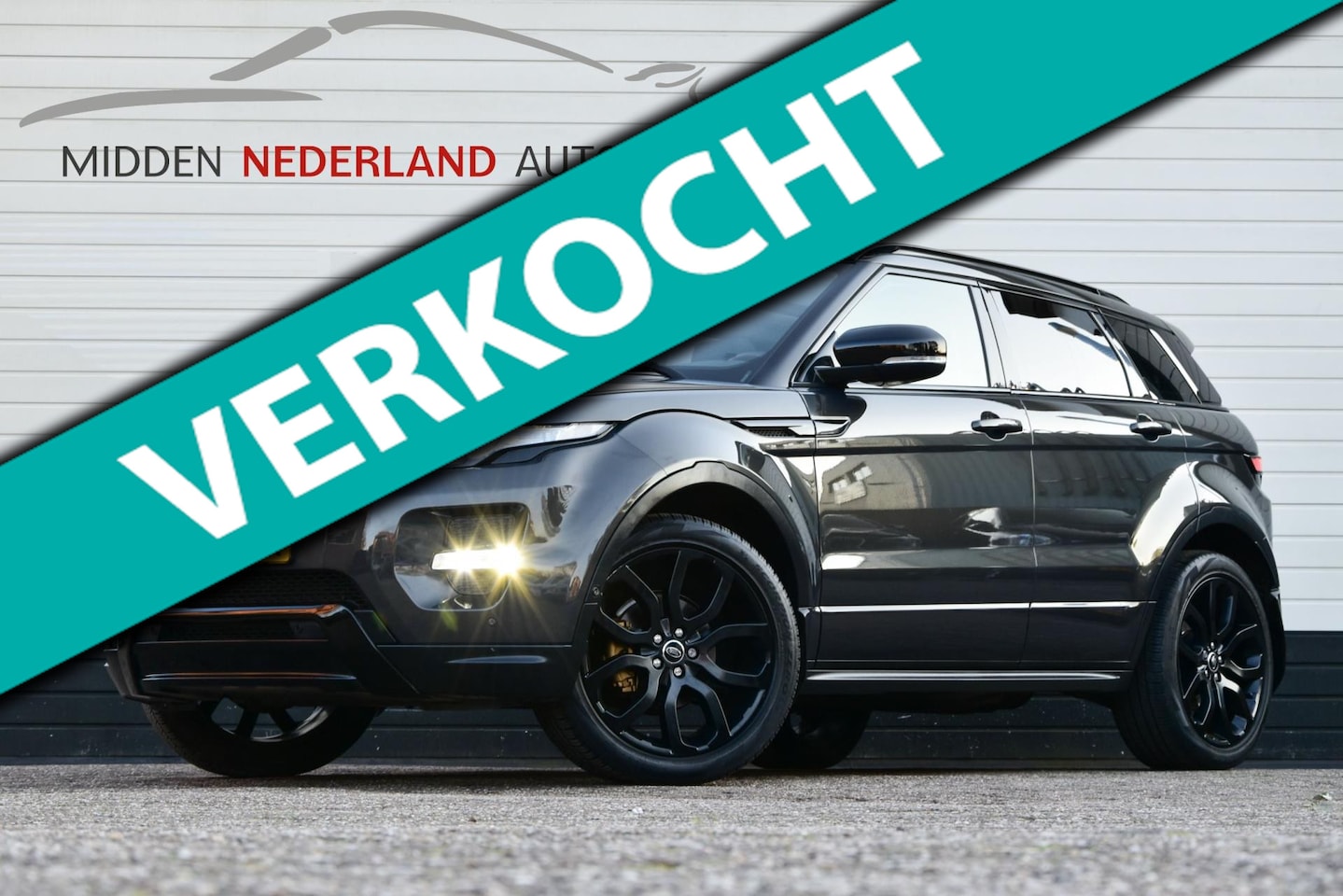 Land Rover Range Rover Evoque - 2.0 Si 4WD Dynamic * PANORAMA DAK * MERIDIAN * CAMERA * ONDERHOUDHISTORIE * - AutoWereld.nl