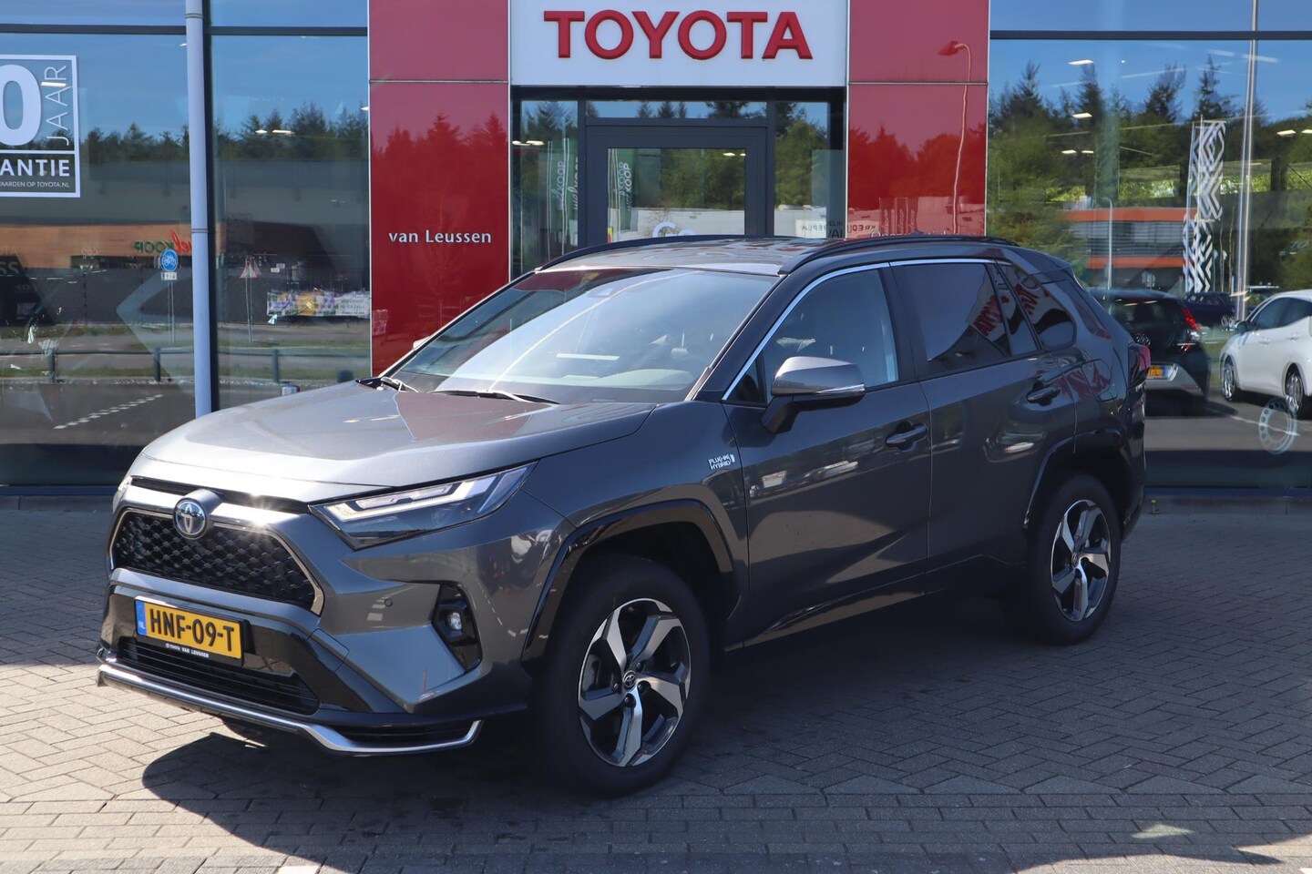 Toyota RAV4 - 2.5 PLUG-IN HYBRID AWD STYLE APPLE/ANDROID P-SENSOREN 18"LMV VIRTUAL-COCKPIT DRAADLOOS-LAD - AutoWereld.nl