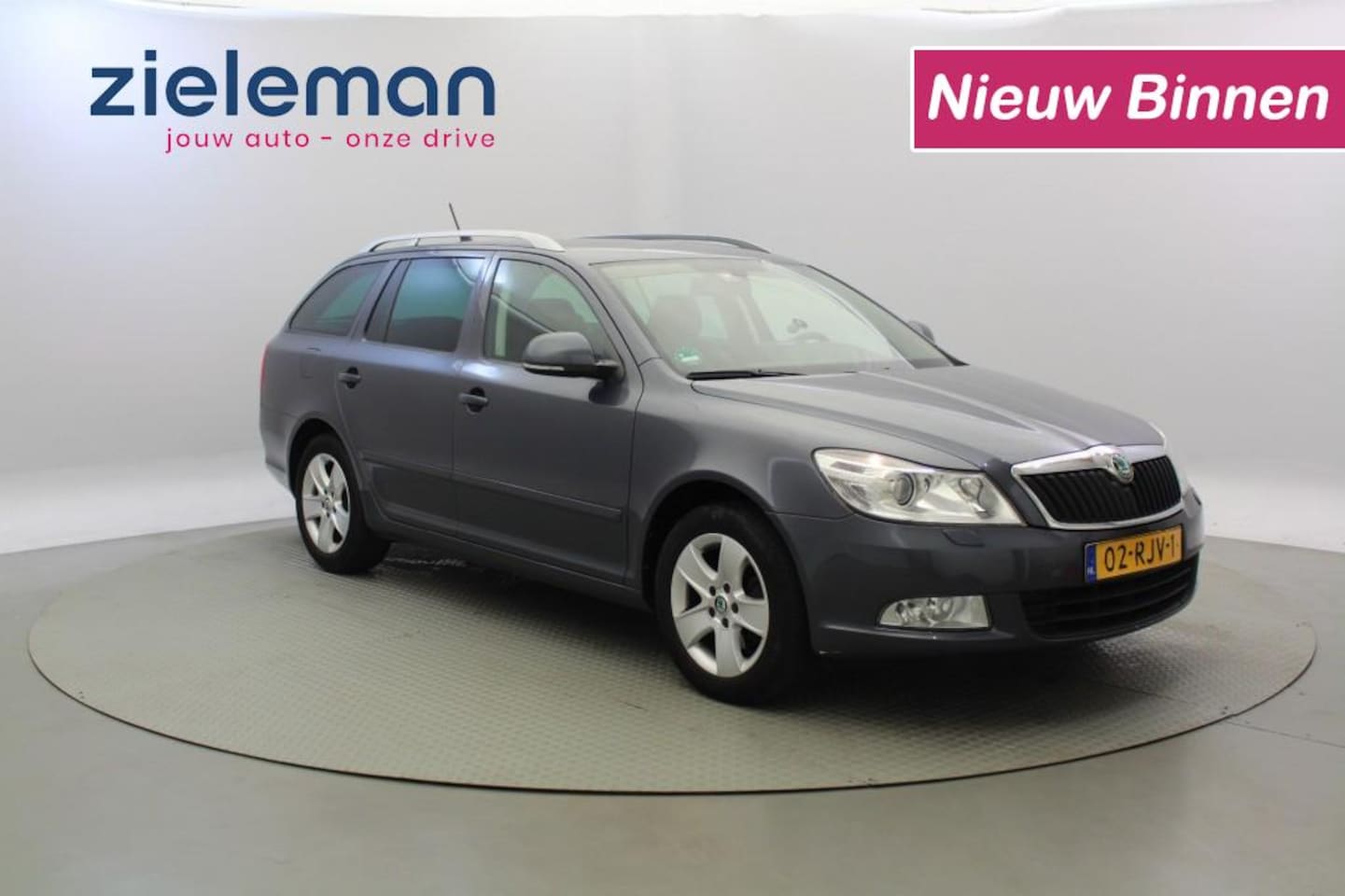 Skoda Octavia Combi - 1.8 TSI Combi Elegance - Clima, Cruise, Trekhaak - AutoWereld.nl
