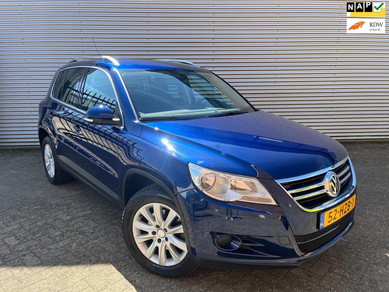 Volkswagen Tiguan - 1.4 TSI Sport&Style 4Motion|Cruise|Airco|Trekhaak|4x4| - AutoWereld.nl