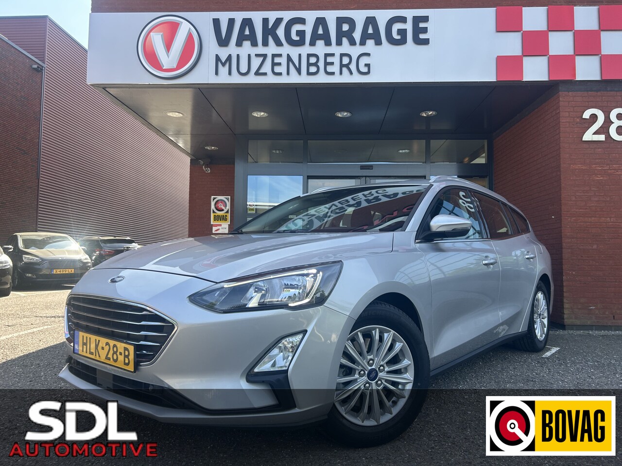 Ford Focus Wagon - 1.5 EcoBoost Active Business // NAVI + CARPLAY // PDC V+A // CLIMA // CRUISE // TREKHAAK!! - AutoWereld.nl