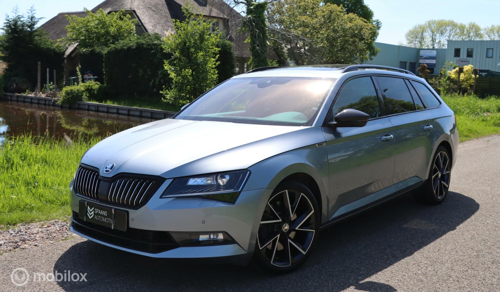 Skoda Superb Combi - 2.0 TSI 4x4 Sportline / Pano / Canton - AutoWereld.nl