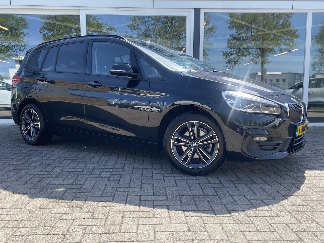 BMW 2-serie Gran Tourer - 216i 7p. High Executive 50% deal 9.225,- ACTIE Sportstoelen / Navi / Clima / Telefoon / Cr - AutoWereld.nl