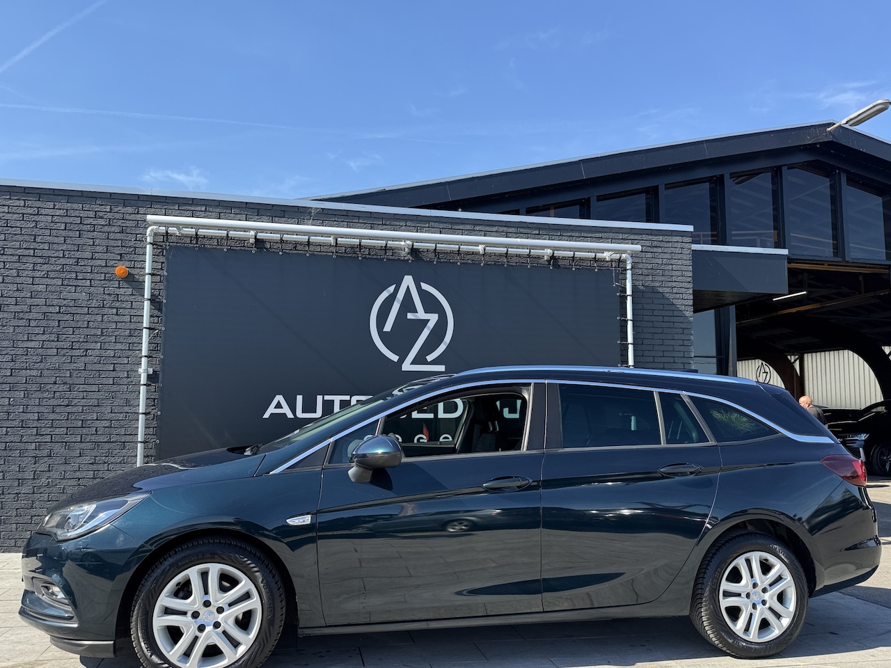 Opel Astra Sports Tourer - 1.0 Online Edition Automaat * NAVI - AutoWereld.nl