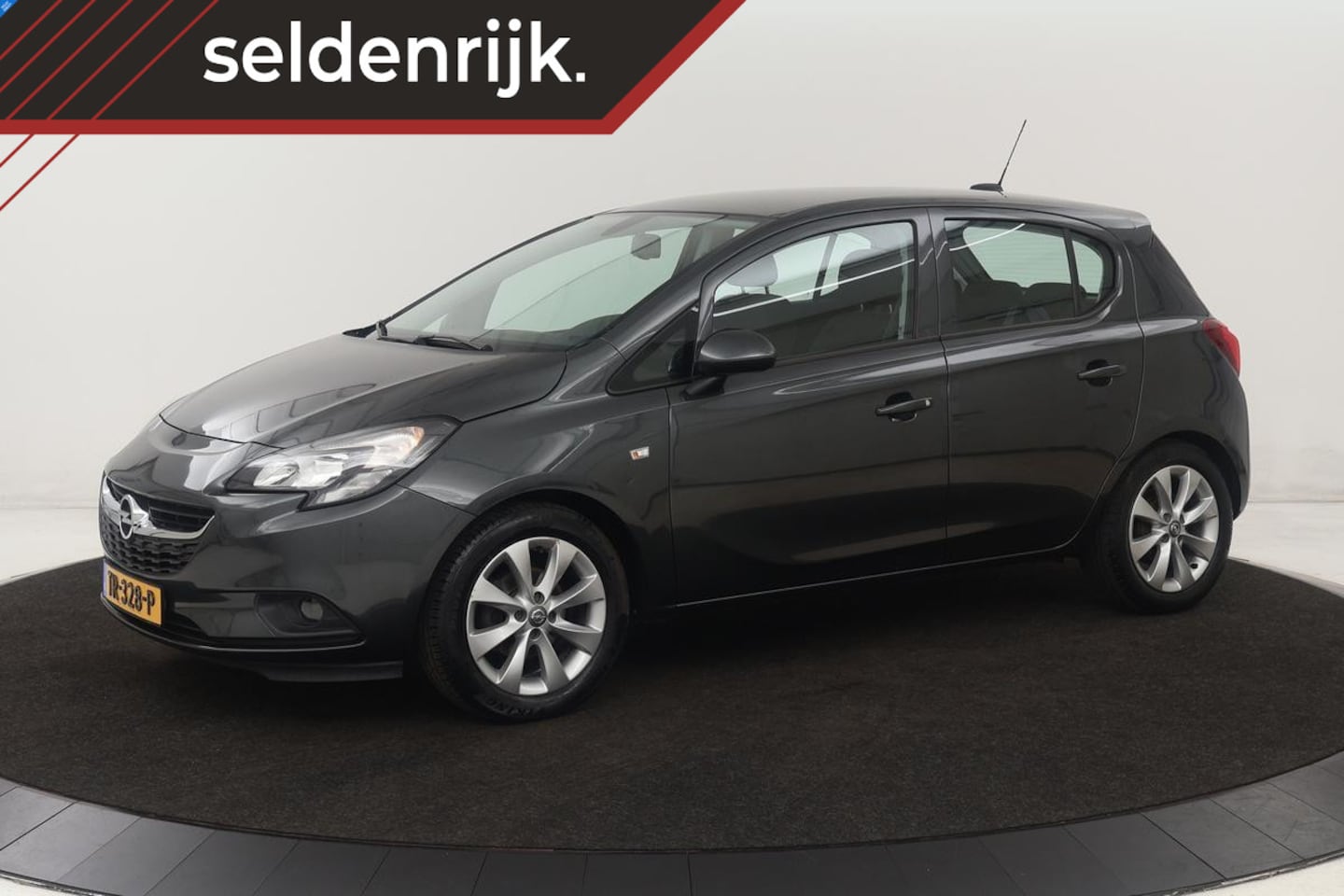 Opel Corsa - 1.4 Favourite | Trekhaak | Carplay | Navigatie | DAB | Airco | Cruise control | Parkeerhul - AutoWereld.nl