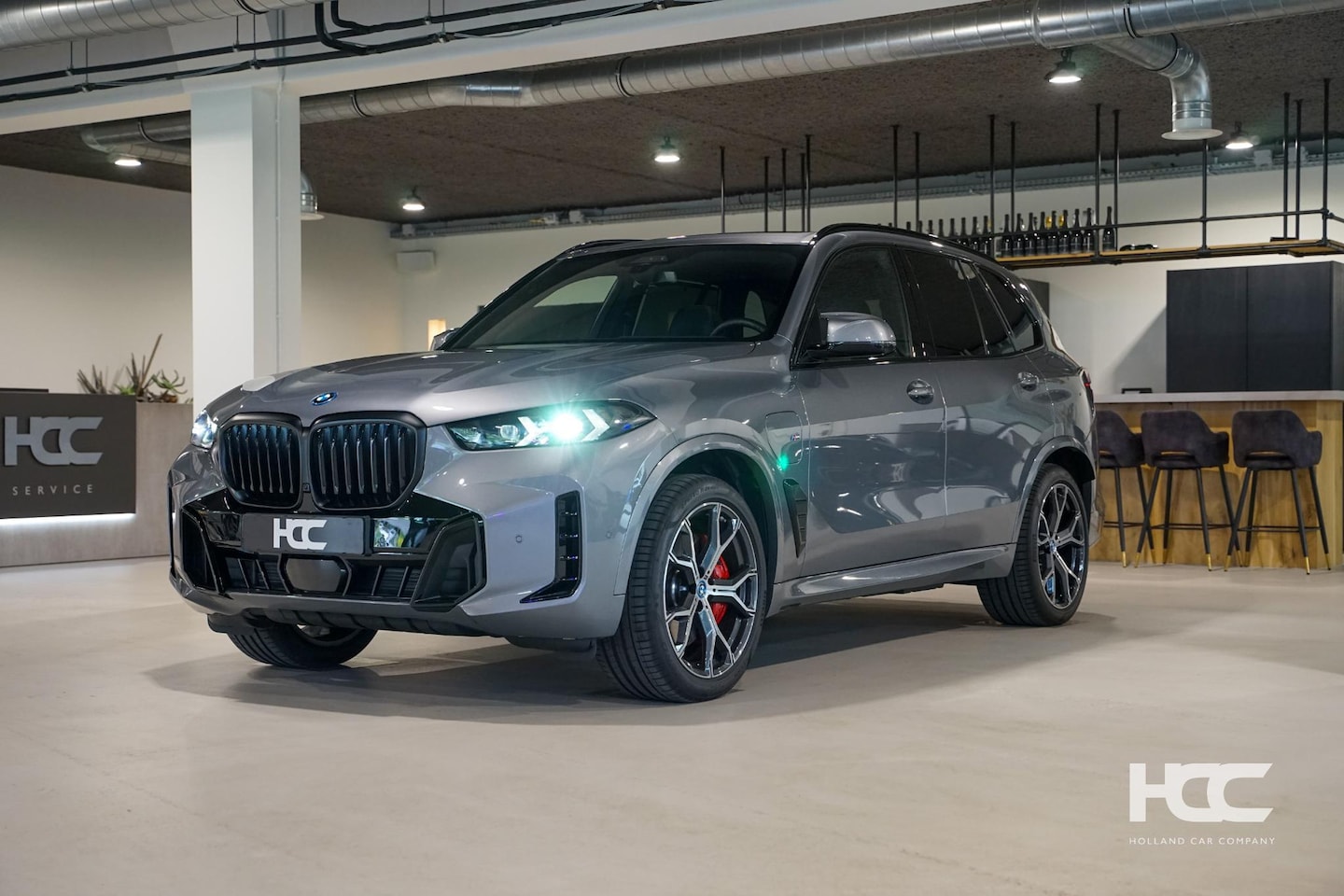 BMW X5 - xDrive50e M Sport Pro | SkyLounge | Alcantara heme - AutoWereld.nl