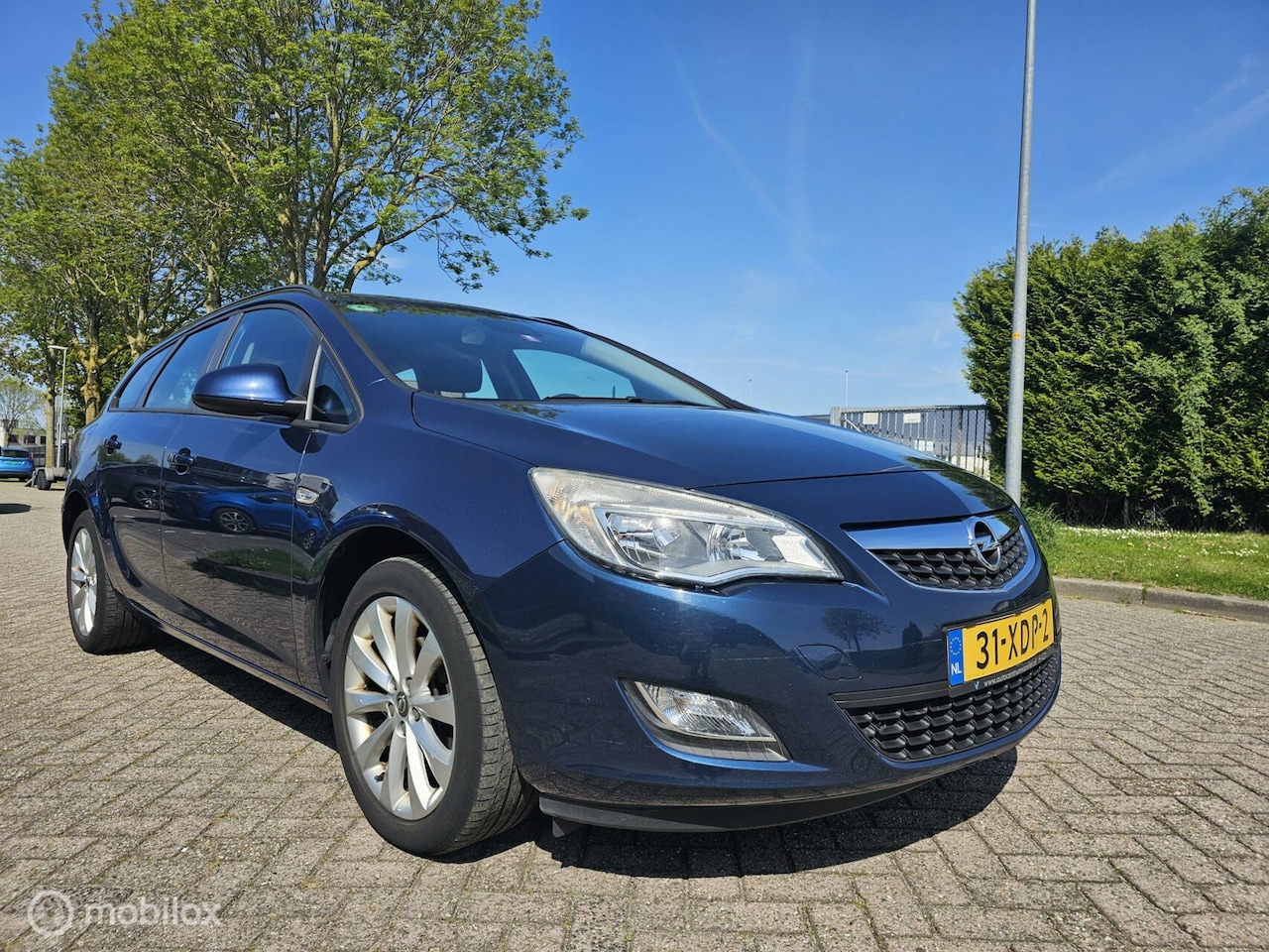 Opel Astra Sports Tourer - 1.4 Turbo Anniversary Edition 1.4 Turbo Anniversary Edition - AutoWereld.nl